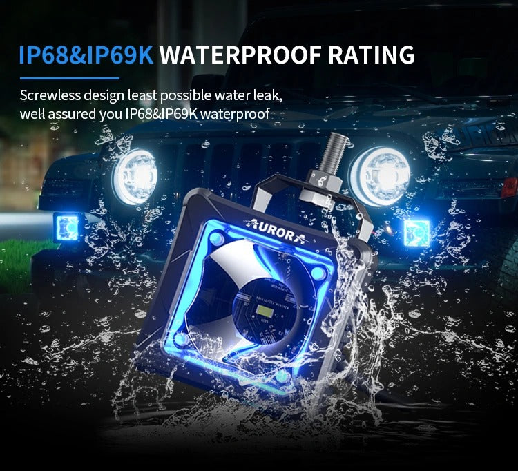 Aurora 3.3-inch RGB LED pod lights — blue pod lights operating in water spray on a vehicle